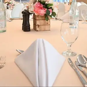 Place settings and flowers on the dinner table